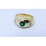 18ct yellow gold emerald and diamond three stone ring the gems in a rub over setting,