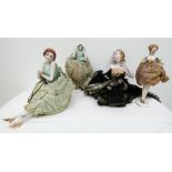 A group of four Art Deco pin cushion half dolls,