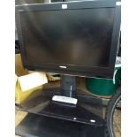 32" Toshiba digital LCD television with Freeview etc on a two tier glass stand