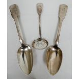 Two Georgian silver tablespoons London 1810 and a silver sifting spoon London 1854 all engraved