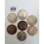 Collection of seven silver USA dollars,