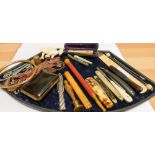 A collection of penknives, cheroot holders, thimble,