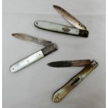 Three 19th century mother of pearl and silver bladed fruit knives