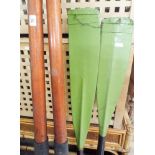 Two large old wooden oars and two old wooden paddles