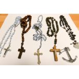 A collection of rosary beads etc