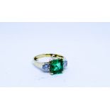 18ct gold 3 stone emerald and diamond ring,