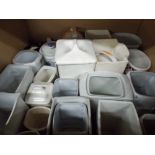 Two large boxes of vases, glass, ornaments, binoculars, place mats,