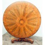 Circular Regency rosewood and marquetry inlaid centre/dining table standing on pillar and tripod