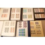 Four albums of British mint stamps together with three albums of Jersey and Guernsey mint stamps,