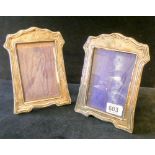 Pair of Edwardian rectangular photograph frames with easel fittings,