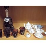 Bohemian decanter with four glasses and a dolls tea set