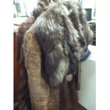 Two fur coats with stoles