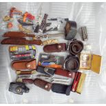 Assorted belts, buckles, knives,