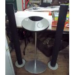 Modern Bang and Olufsen BEO Centre 2 player unit on tower base with two tall speakers,