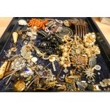 A large selection of Victorian and later costume jewellery to include a tortoiseshell hair comb,