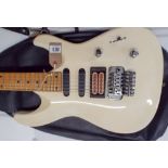 Tanglewood six string electric guitar in cream with a five-way selector switch in its black leather