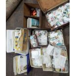 Large accumulation of British commonwealth and world stamps contained within various boxes and tins