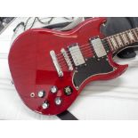 Shine six string red and black electric guitar with two tone and two volume controls in its black