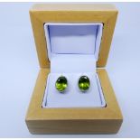 Pair of matching 18ct white gold and peridot ear studs