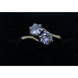 18ct yellow gold two stone diamond cross over design ring set 2 diamonds of approx 40pts each,