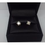 Pair of diamond solitaire ear studs, set with brilliant cut diamonds of approximately 1.2 carats.