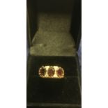 9ct yellow gold three stone garnet ring