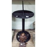 Metal black painted sundial and a Nelson heavy door stop