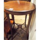 Edwardian circular occasional table with small plant stand under