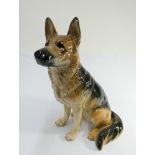 A Beswick fireside model of a German Shepherd dog numbered on base 2410 height 35cms