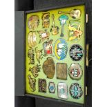 Case of 22 decorative American brass and other belt buckles to include enamelled and turquoise