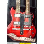 Double necked red Bluerock electric guitar with six and twelve strings in its fitted hard case