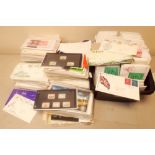 A very large accumulation of Jersey and Guernsey first day covers and mint stamps from the 1970's