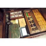 Box with vintage games and crib scorer in