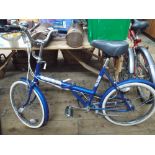 Blue Triumph folding bicycle