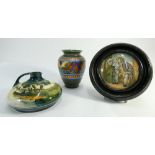 Two pieces of Gouda pottery and a pot lid in frame