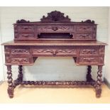 Victorian carved oak pussy cat style desk fitted three drawers with stand-up back fitted five