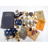 Interesting collection of military items to include many German badges, eagles, British badges,