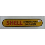 A large Shell Oil sign