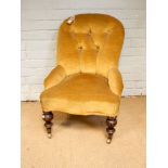 A small late Victorian occasional chair upholstered in buttoned gold dralon