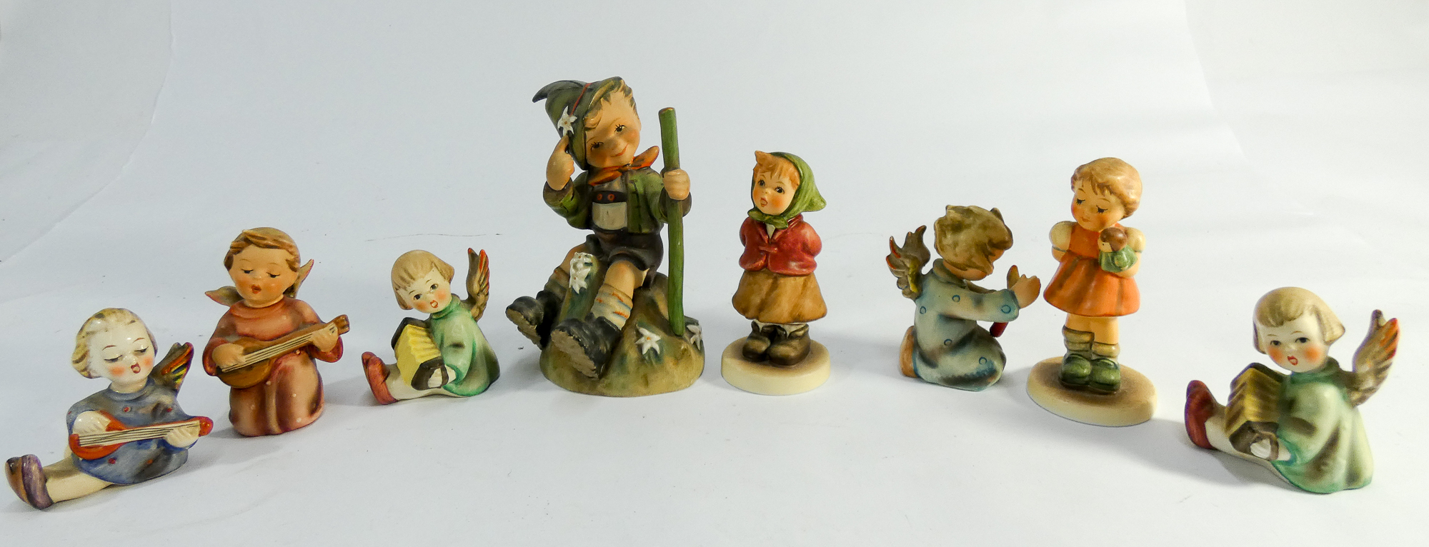 Collection of eight Hummel figurines