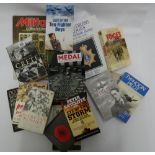 Assorted books on medals, cap badges,