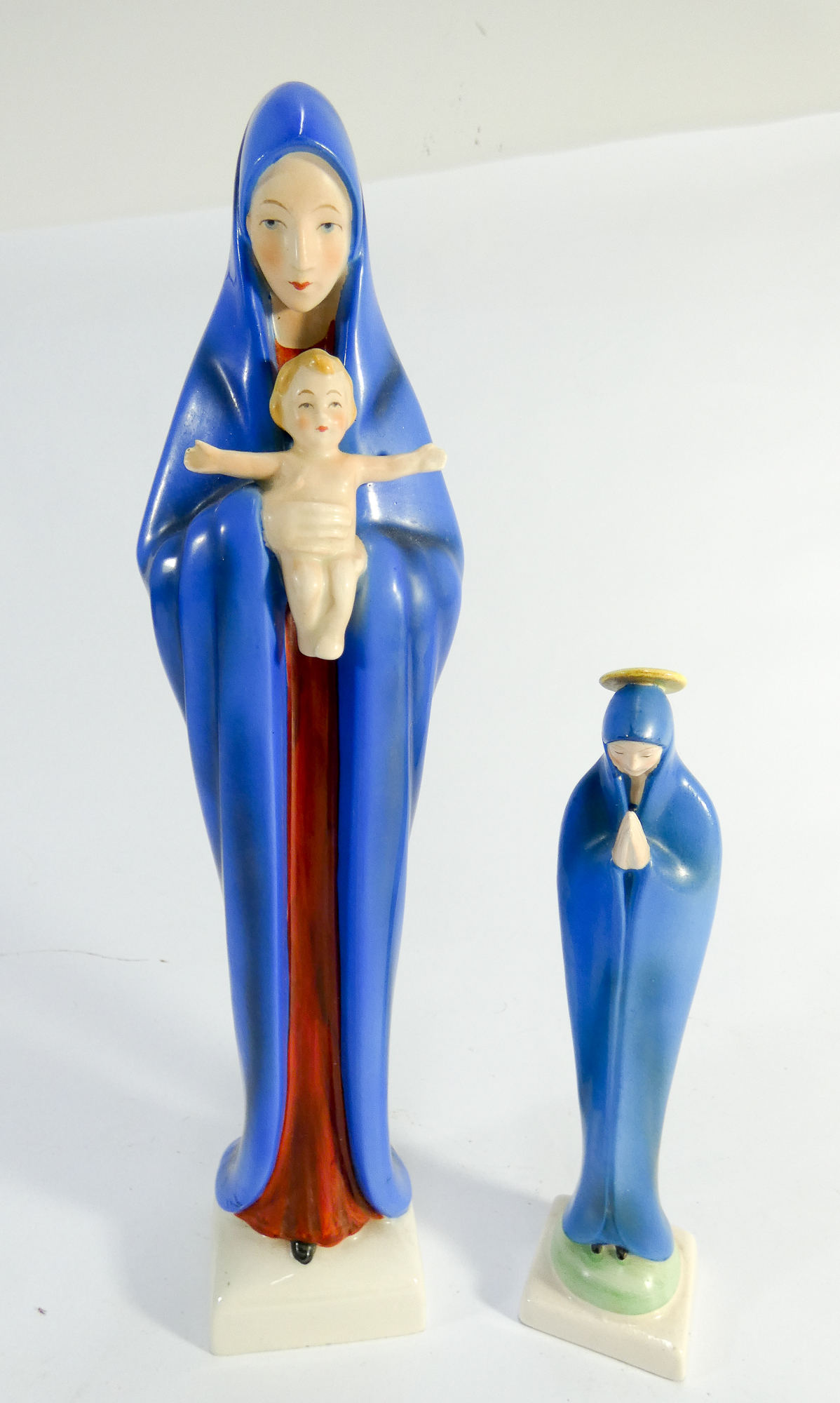 Model of the Virgin Mary with infant Christ and another of Mary with halo,