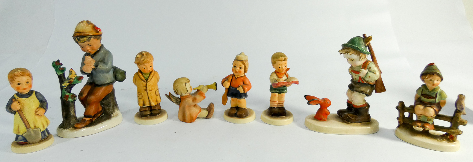 Group of eight Hummel figurines