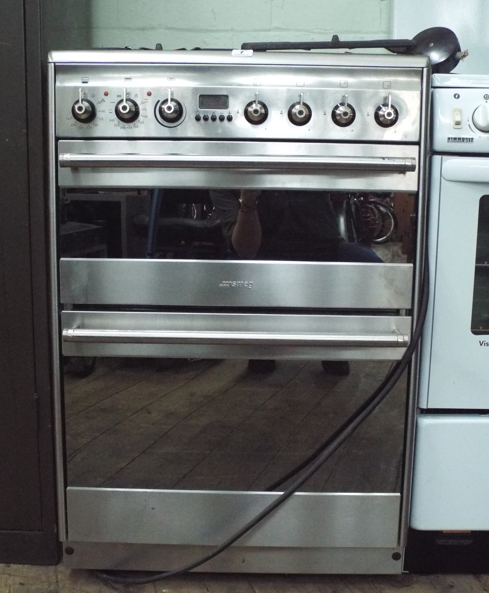 Smeg four ring gas cooker in stainless steel case in very good condition