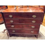 Late Georgian mahogany chest of four long drawers with brass handles standing on splayed bracket
