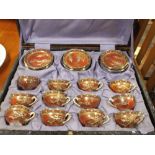 A Japanese Satsuma coffee set of 12 cups and 12 saucers in case
