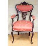 Edwardian ebonised framed elbow chair on cabriole legs with pink upholstered seat and back pad