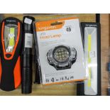 Four assorted torches and lamps and an LED headlamp