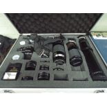 Practika Camera with large quantity of lenses and other accessories in a fitted aluminium box