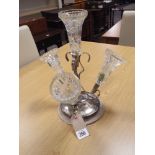 A silver plated four trumpet pressed glass epergne